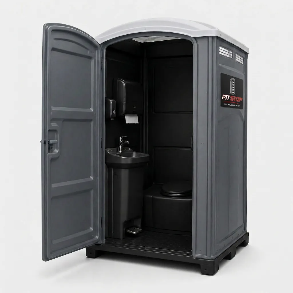 Deluxe portable restroom with the door open showing the interior foot-pedal sink